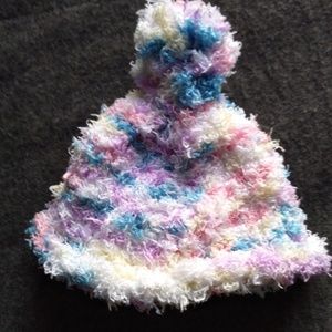 Handmade knitted baby hat.